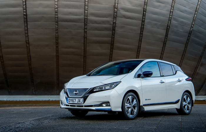 White Nissan Leaf parked
